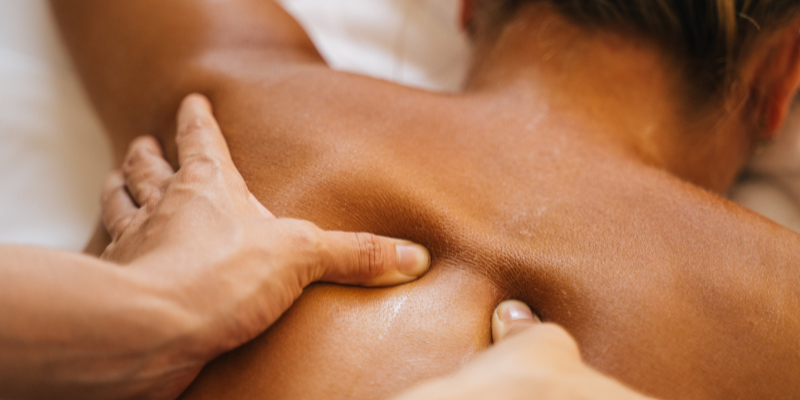 Woman being massaged with YES natural lubricant